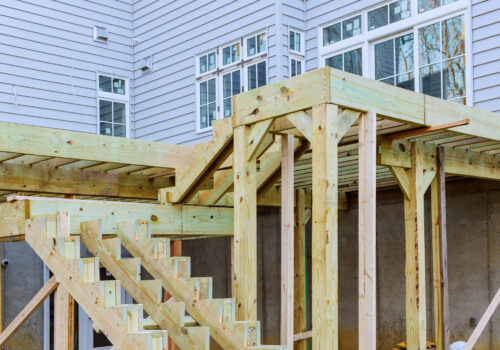 Fragment planks installing wood floor for patio deck with new wooden decking